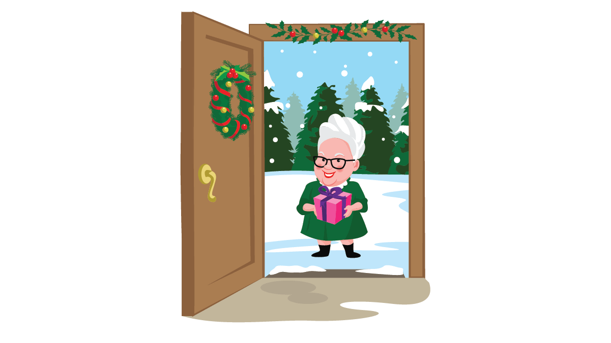Mrs. Claus standing at an open decorated door, holding a gift with snowy pine trees in the background