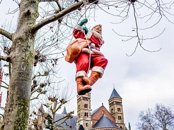 Sinterklaas Hanging On A Rope From A Tree Branch At The 2019 Christmas Market In Maastricht Netherlands