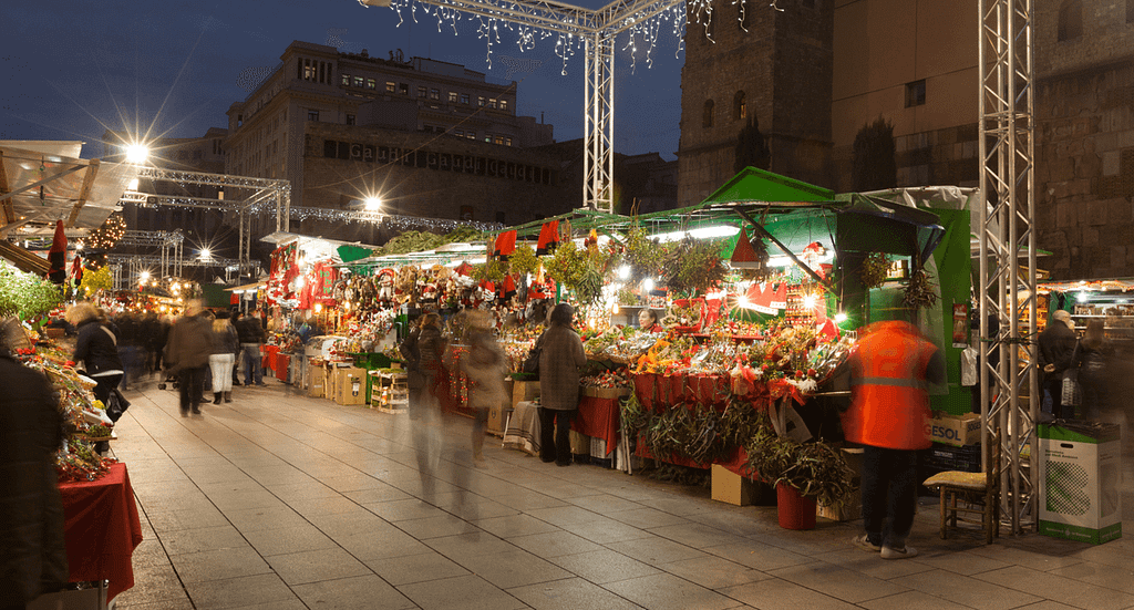 A festive image of Christmas decorations and lights at a Spanish Christmas market, capturing the essence of Christmas in Spain