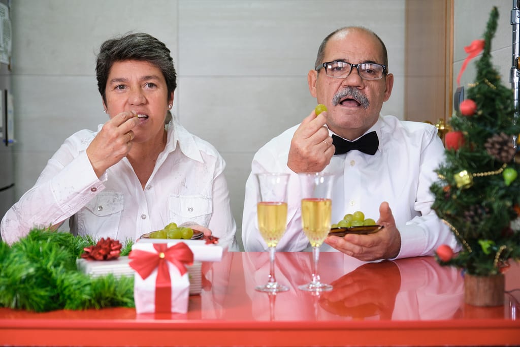 People eating twelve grapes at midnight in Puerta del Sol