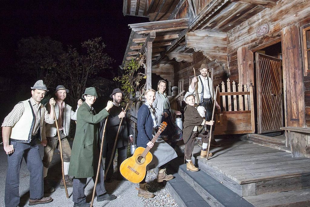 People Seeking Shelter In A House During The Anklöpfler Custom In Austria