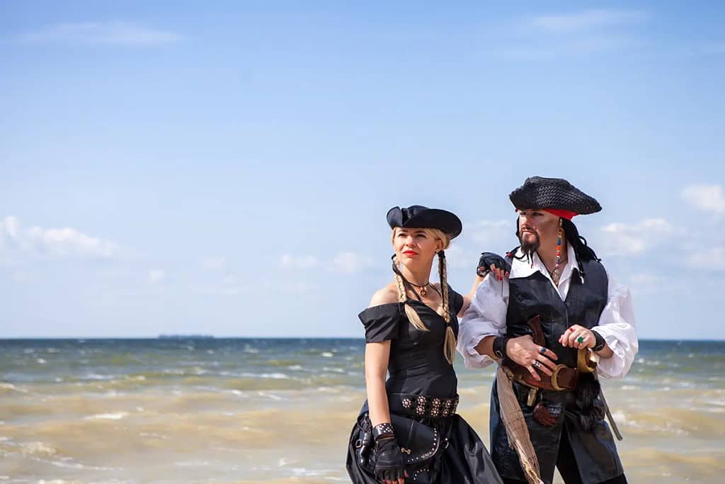 Man And Woman Pirates On The Beach