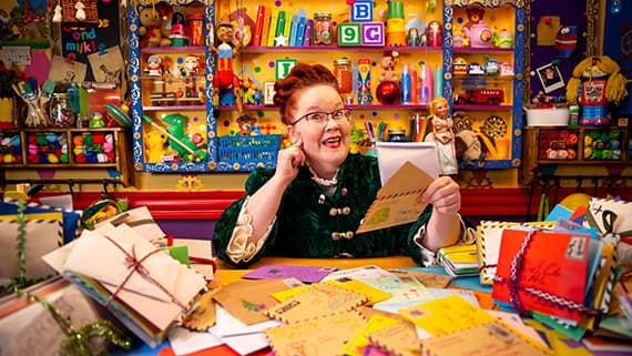 Katie Claus Reading Letters To Santa