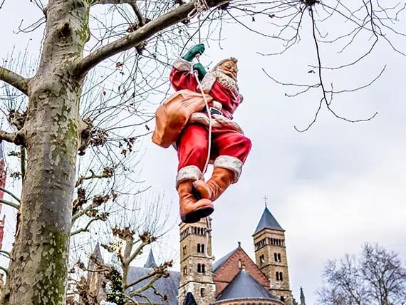 Sinterklaas Hanging On A Rope From A Tree Branch At The 2019 Christmas Market In Maastricht Netherlands