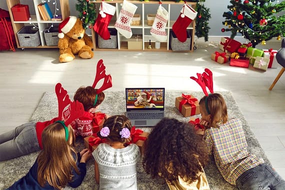 A group of children having a magical experience with virtual Santa